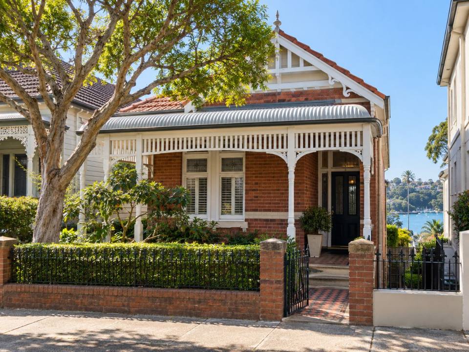 Mature tree beside an established home in Manly Ward on the Northern Beaches
